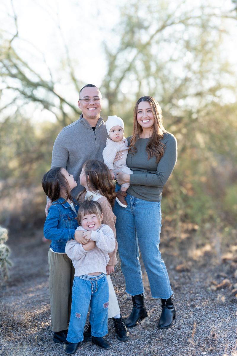 Nate with his wife, Christina, and their four children in the Arizona desert
